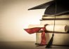 graduation-scroll-and-book-stack-picture-id185520715