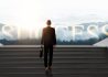 Confidential businessman in suit holding bag walk to success on